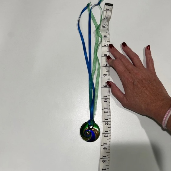 Unusual pendant on ribbon - Picture 2 of 4